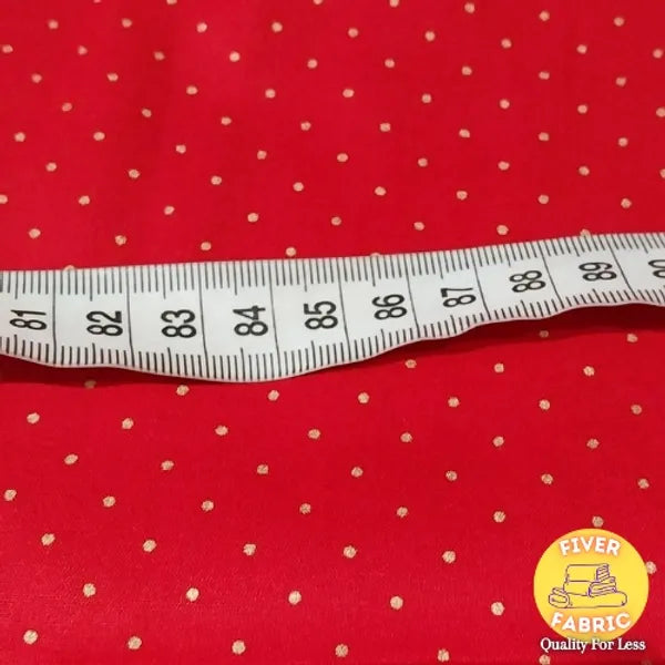Small Gold Spot on Red Cotton