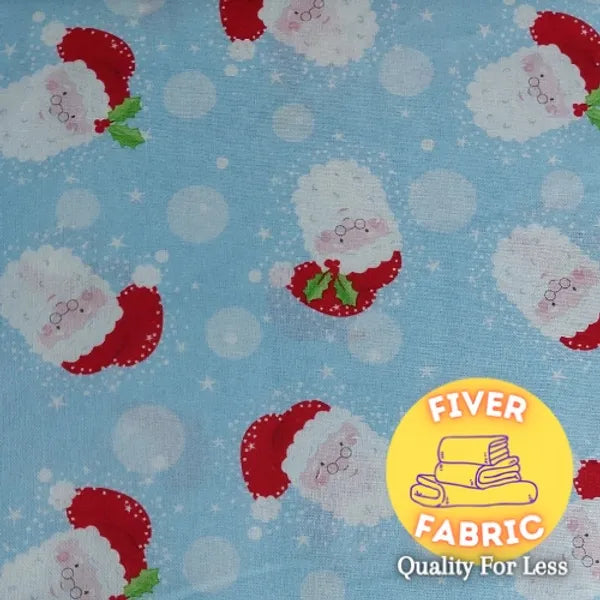 Santa Faces on Blue cotton