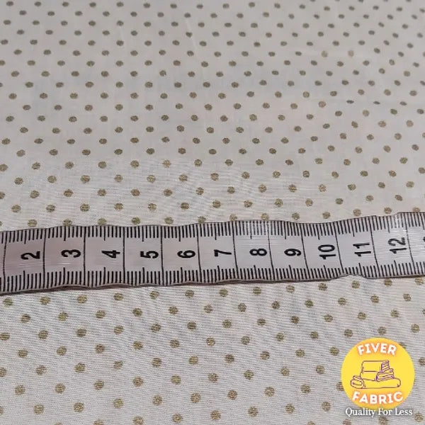 Gold spot on cream cotton