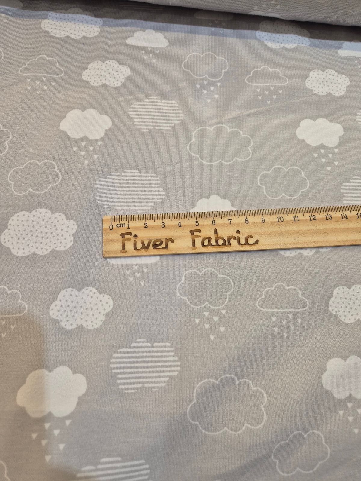Clouds on grey cotton lycra