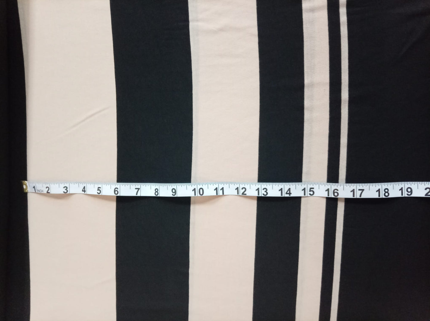 Beige and black striped jersey