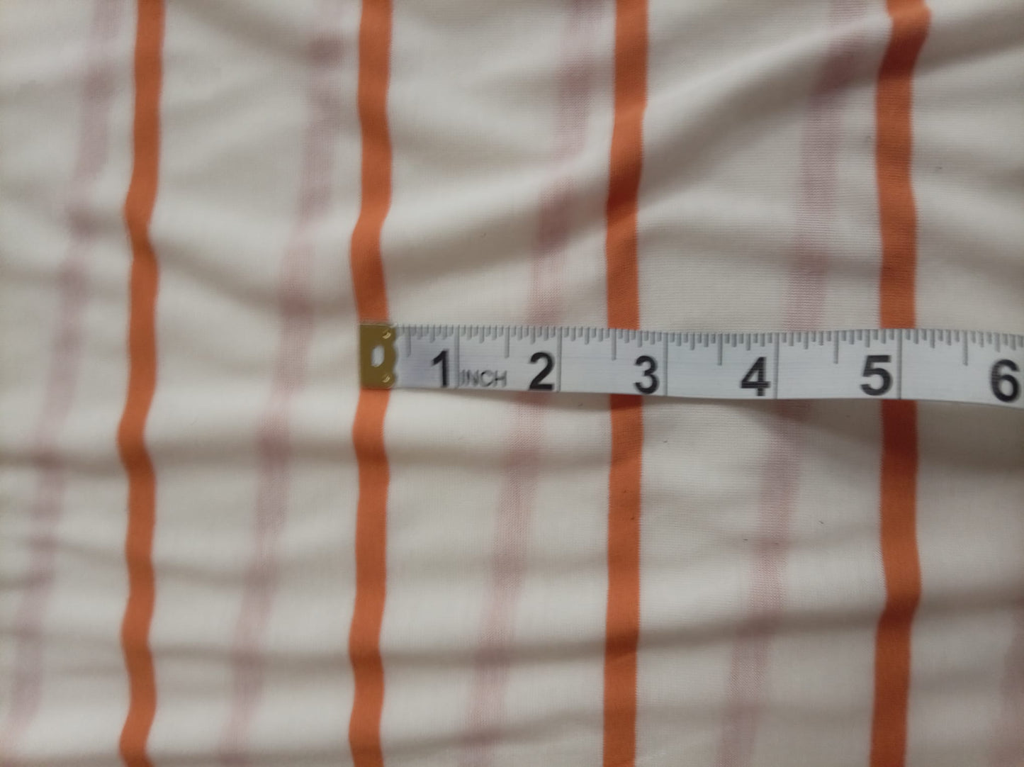 Orange and white striped jersey