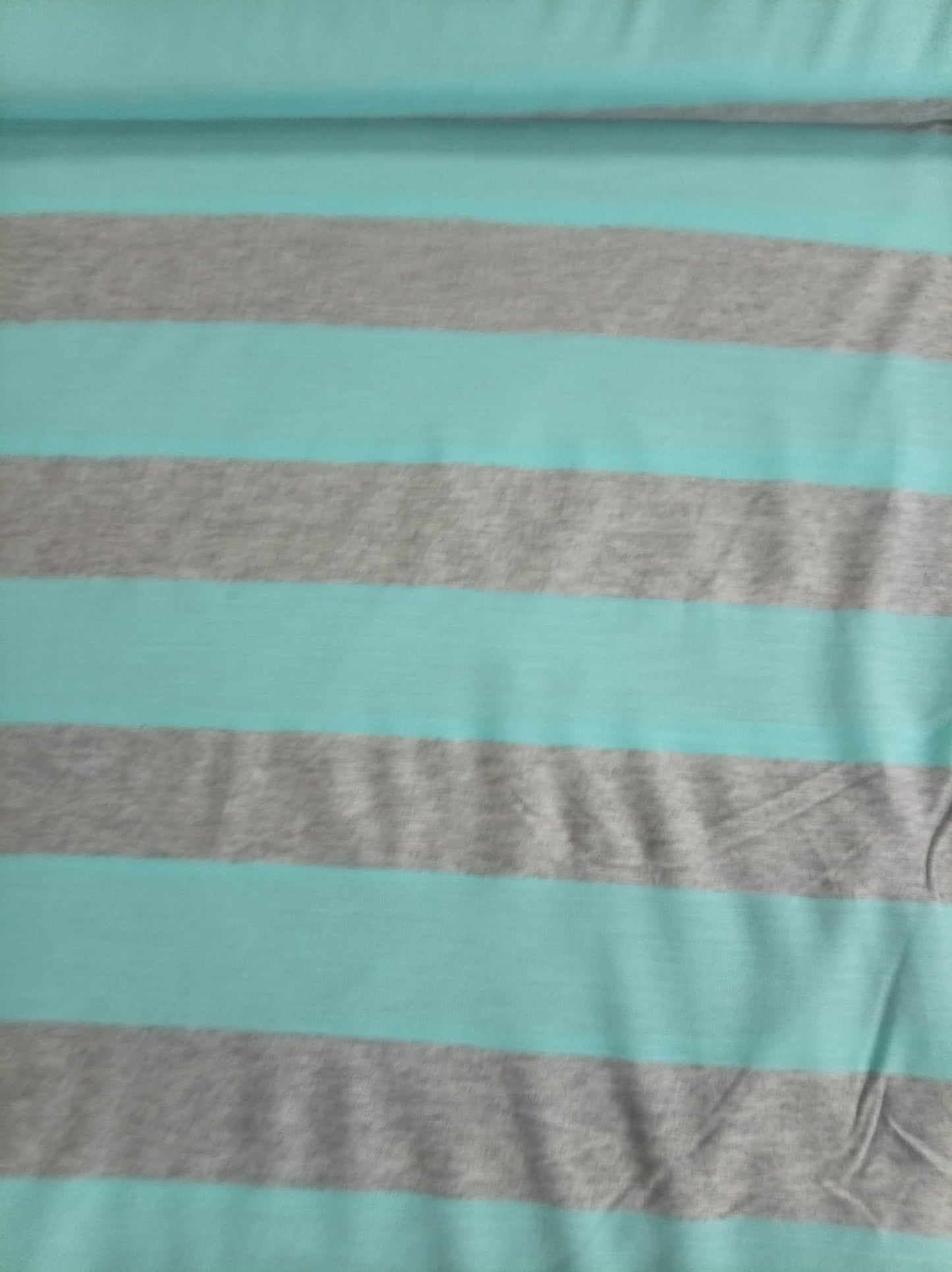 Blue and grey striped jersey