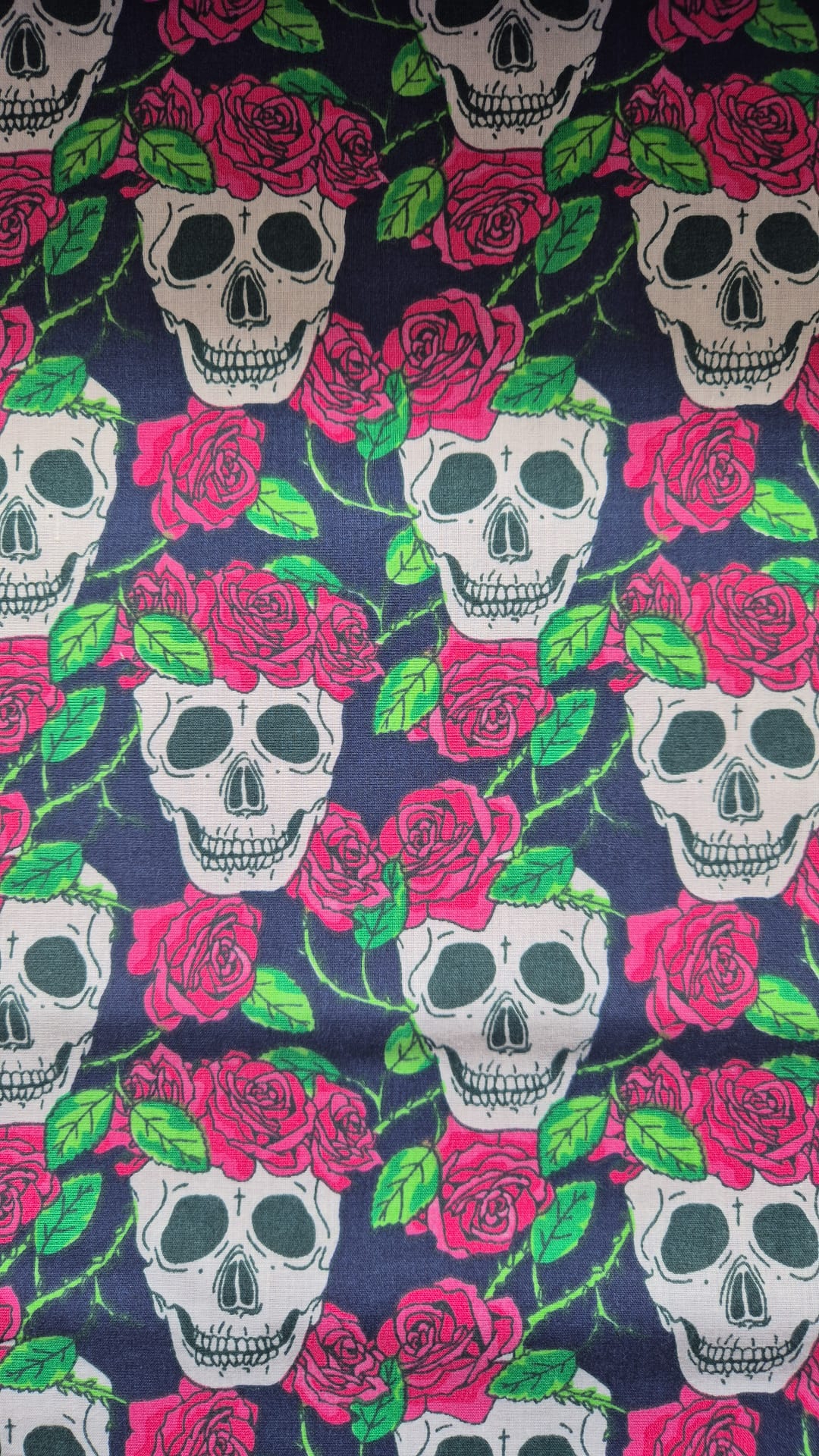 Skulls and roses on navy