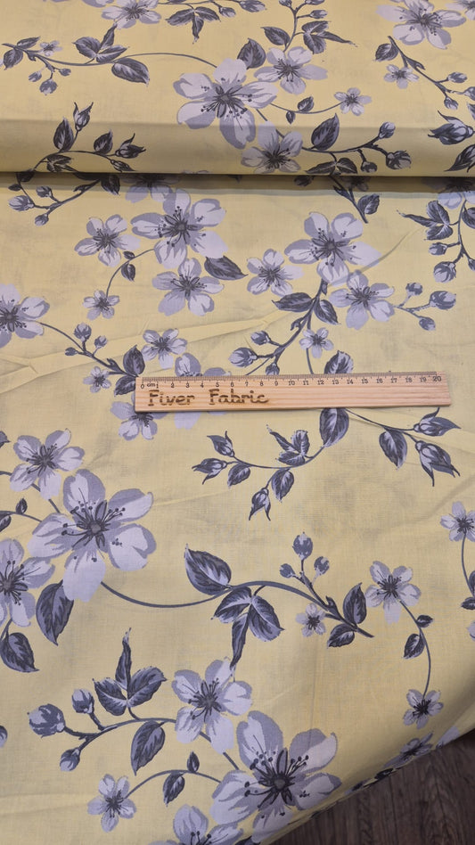 100% cotton flowers on yellow