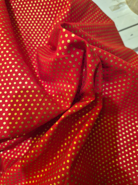 Small Gold Spot on Red Cotton