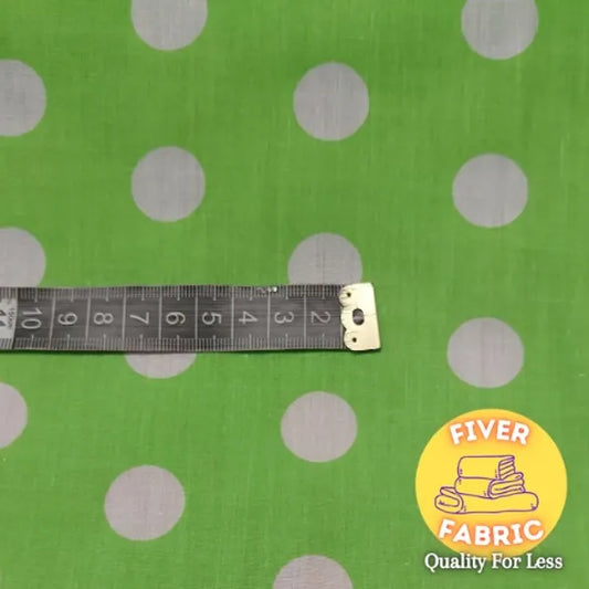 Lime polka dot polycotton