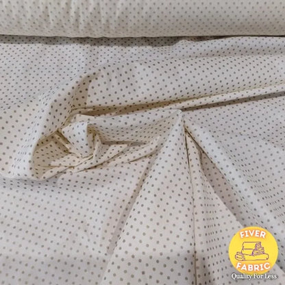 Gold spot on cream cotton