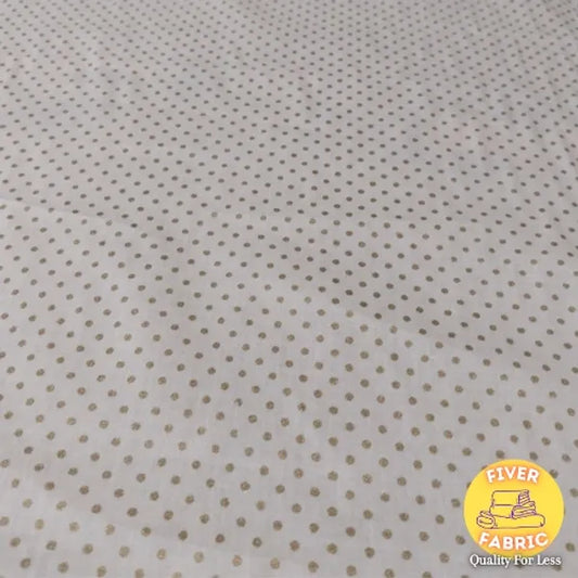 Gold spot on cream cotton