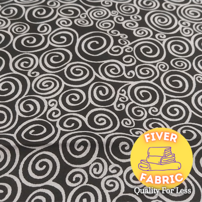 Swirls on black cotton