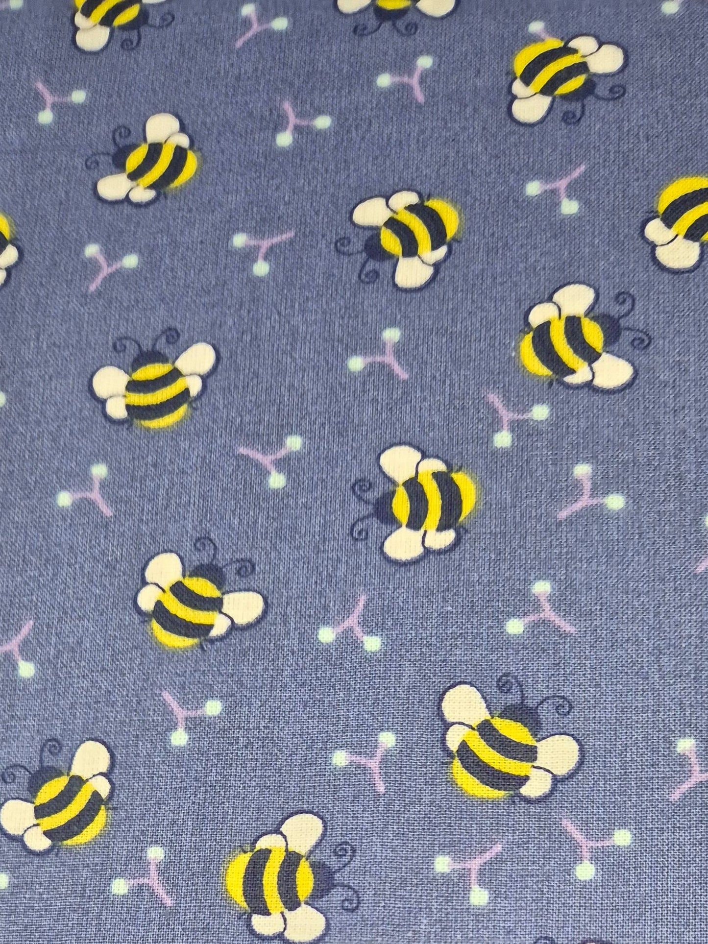 100% cotton bees on blue