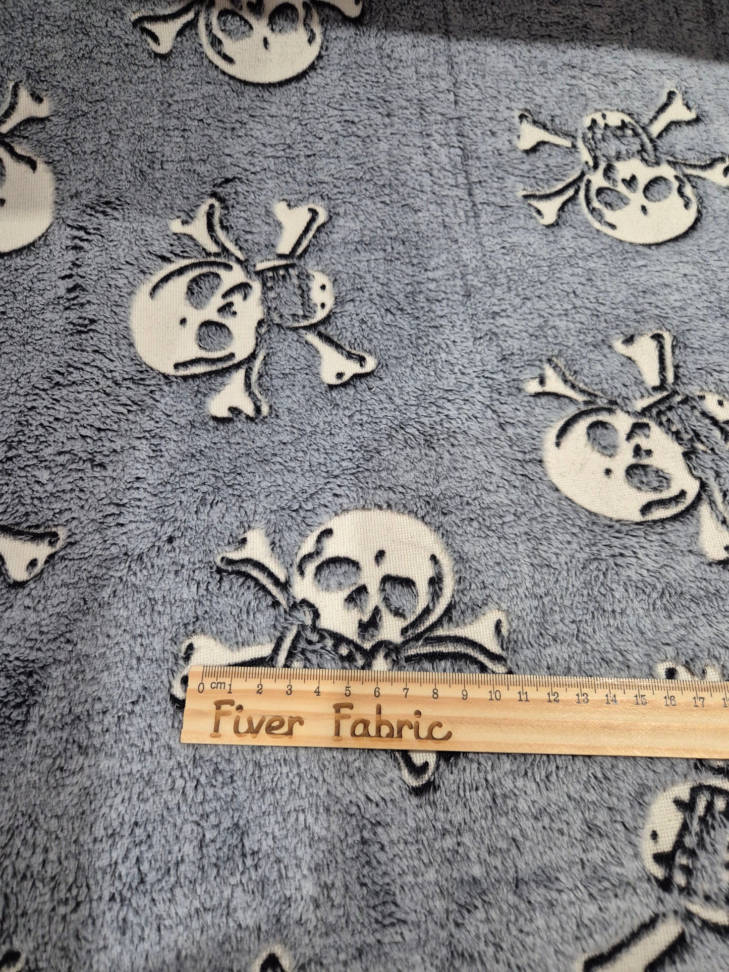 Glow in the dark skulls cuddle fleece
