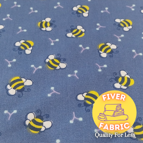 Bees on blue cotton
