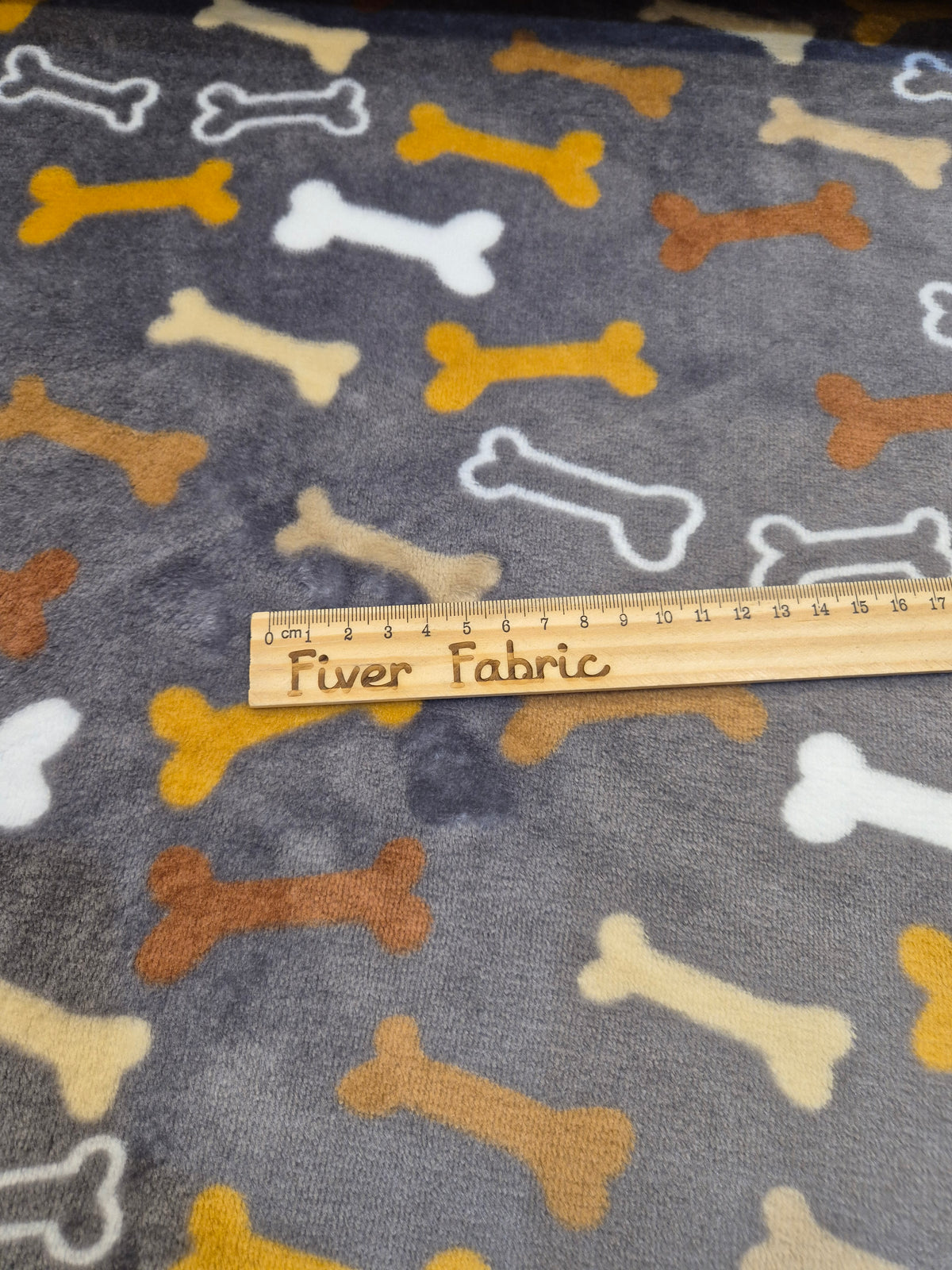 Multi colour Bones on grey cuddle fleece
