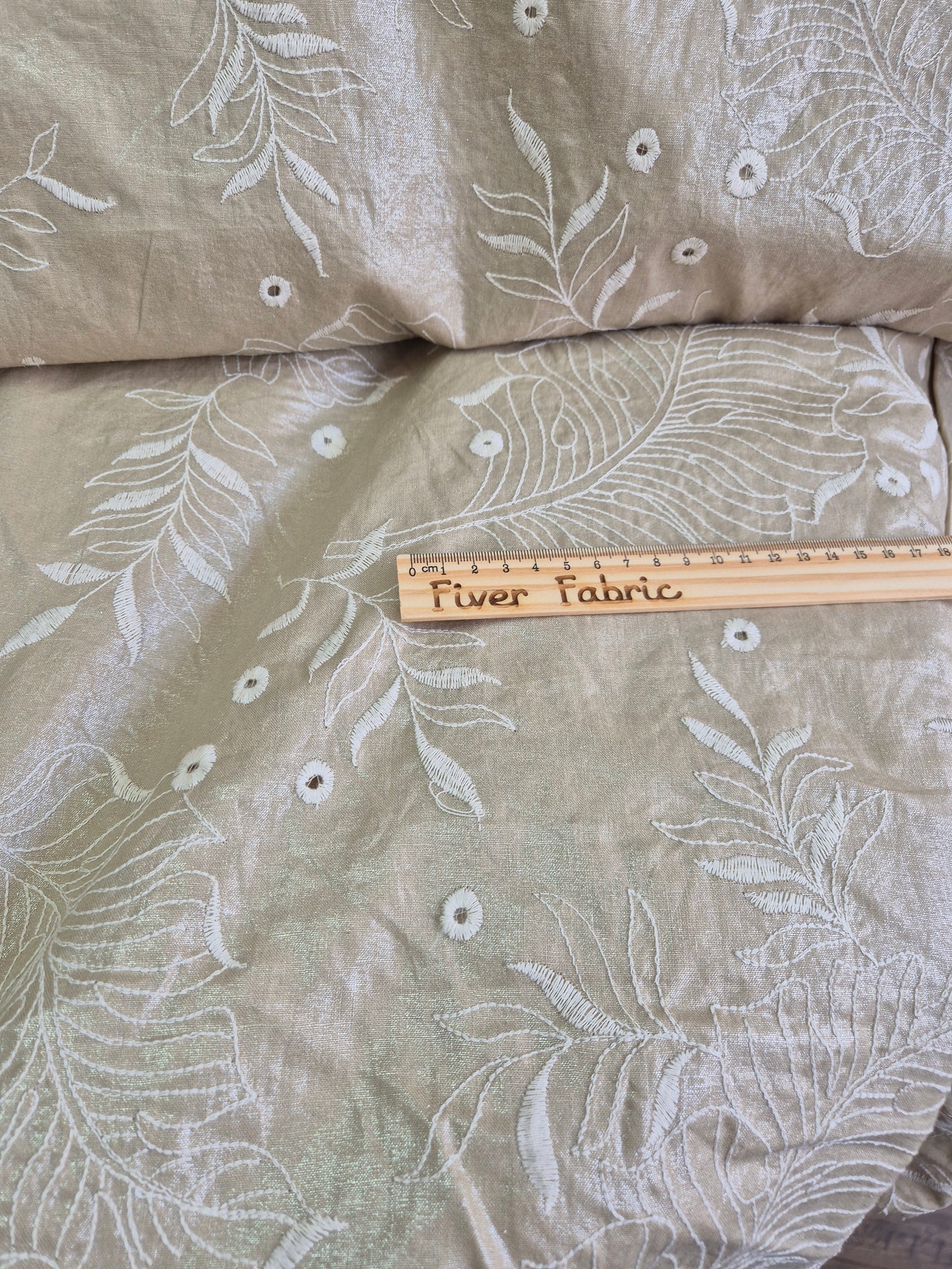 Embroidered linen with shimmer