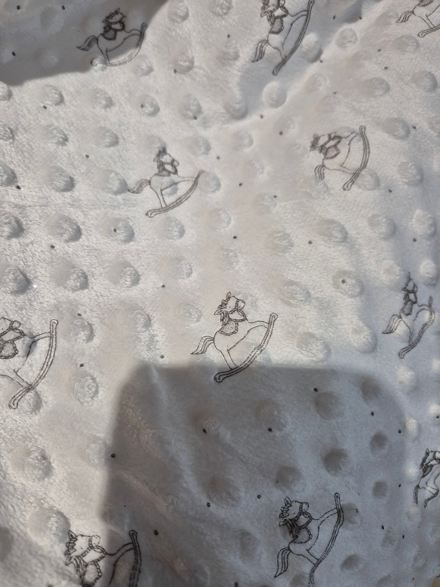 Dimple fleece white rocking horse