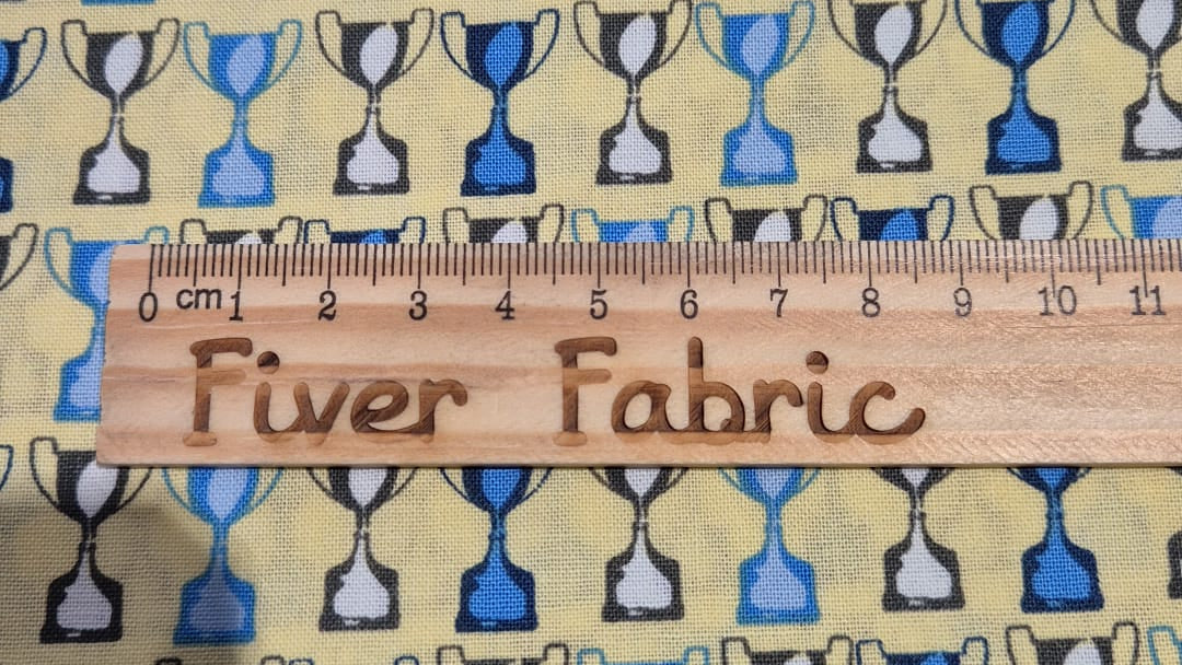 100% cotton trophies on yellow