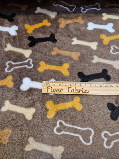 Multi colour Bones on brown cuddle fleece