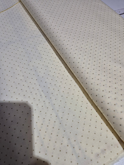 Gold spot on cream cotton