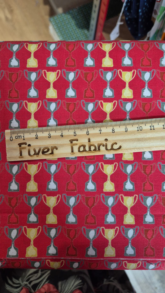 100% cotton trophies on red