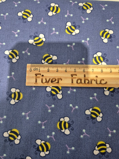 100% cotton bees on blue
